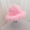 Large pink feather hat. Pamela Anderson costume.